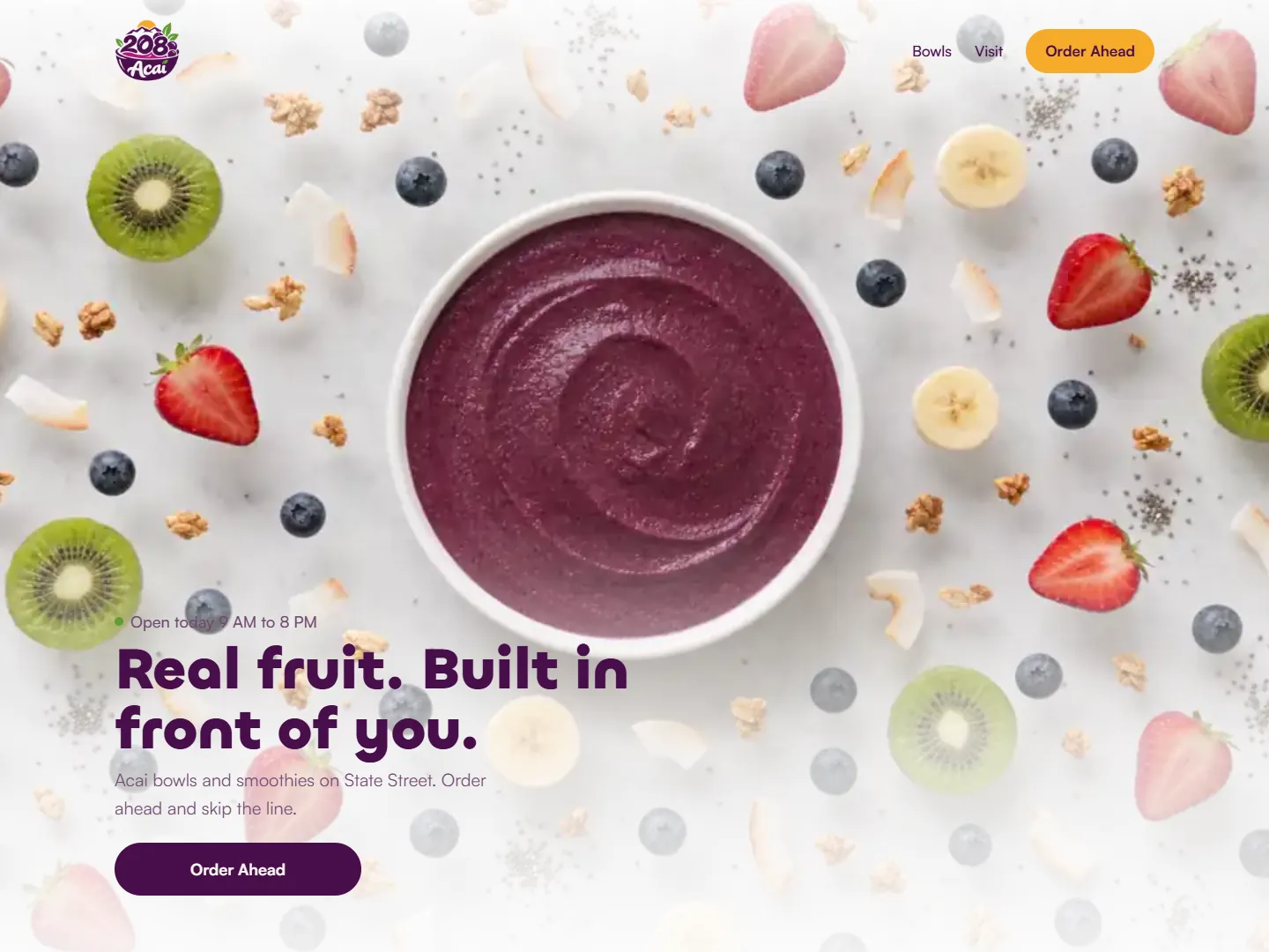 The 208 Acai home page in a browser: an acai bowl among fresh fruit under the headline Real fruit. Built in front of you.