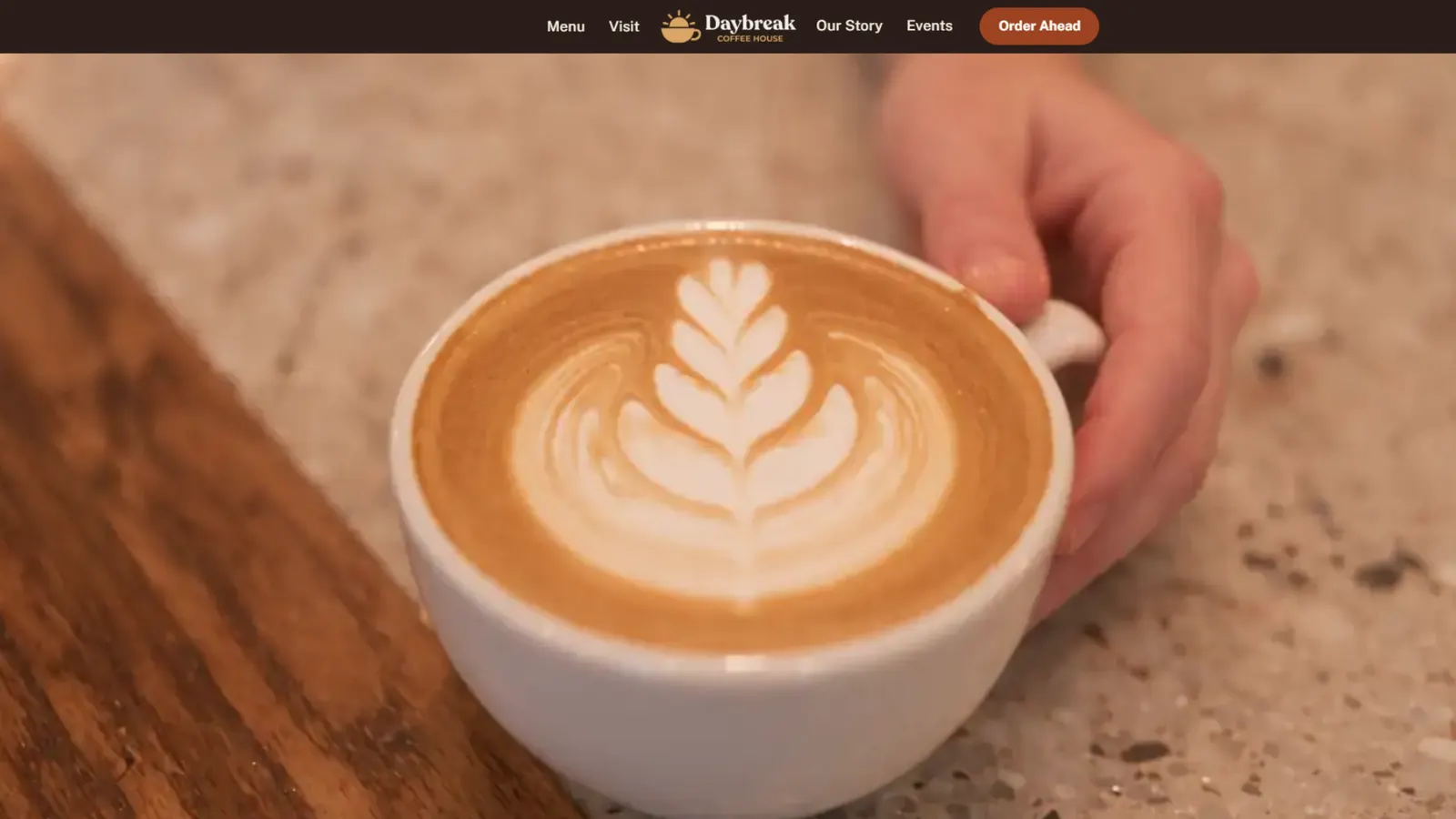 The end of the Daybreak home page film: a finished latte on the counter
